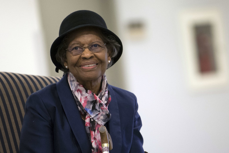 Gladys Mae West seated, smiling 