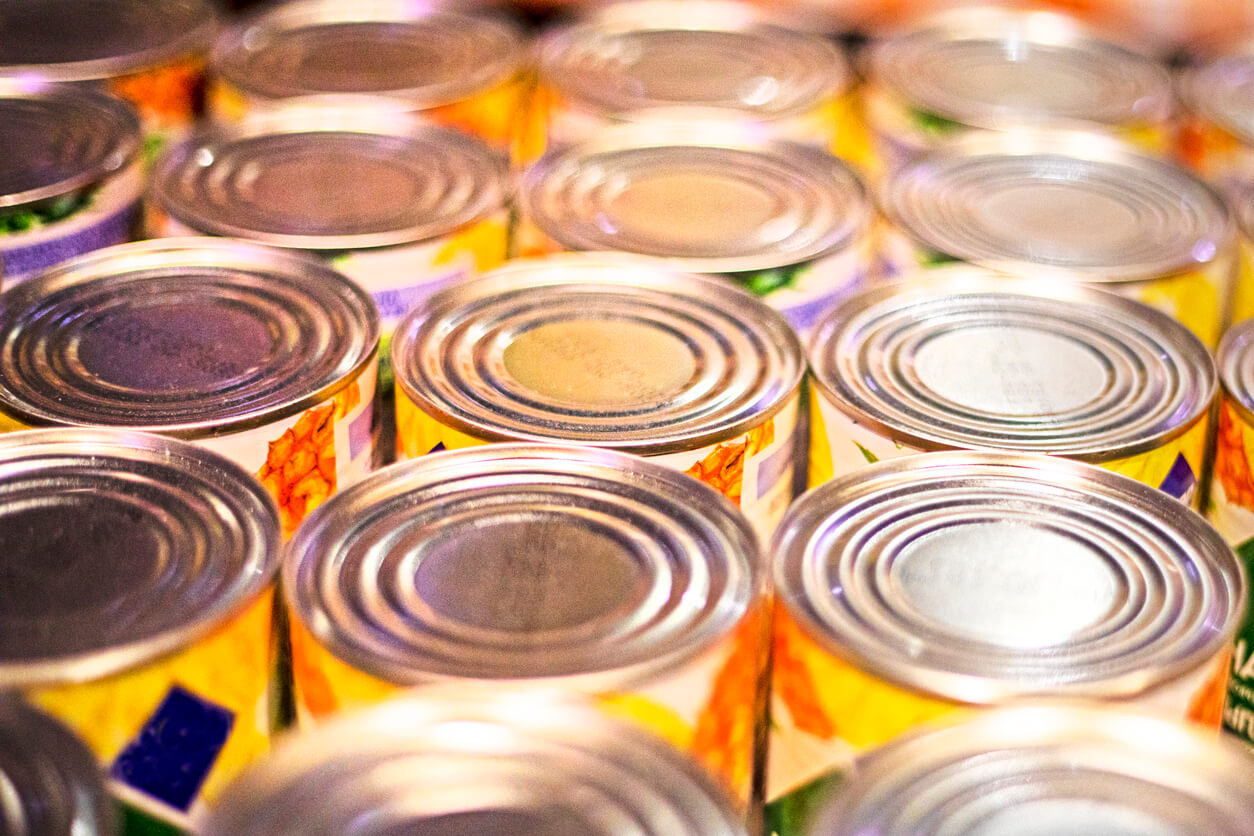 aluminum cans in three neat rows